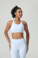 Top Deportivo "Asymmetric Balance" – Soporte de Medio Impacto con Textura Dinámica